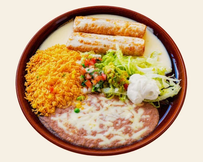 Especial flautas under cheese sauce with rice, beans and sour cream